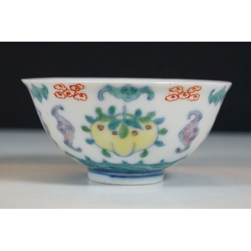 2 - Pair of 19th Century Chinese tea bowls to include a footed cup decorated with florals with a six cha... 