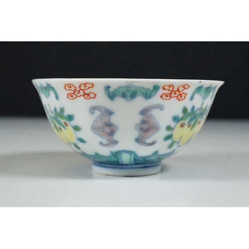 2 - Pair of 19th Century Chinese tea bowls to include a footed cup decorated with florals with a six cha... 