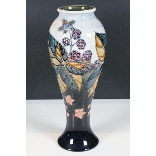 23 - Moorcroft 'Bramble' design baluster shaped vase, initialled and stamped to base H 28cm