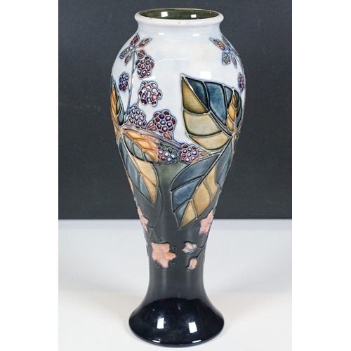 23 - Moorcroft 'Bramble' design baluster shaped vase, initialled and stamped to base H 28cm