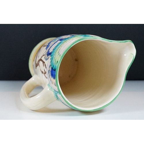 24 - Bizarre by Clarice Cliff large Art Deco hand painted jug in 'Rhodanthe' pattern, with a stylised tre... 