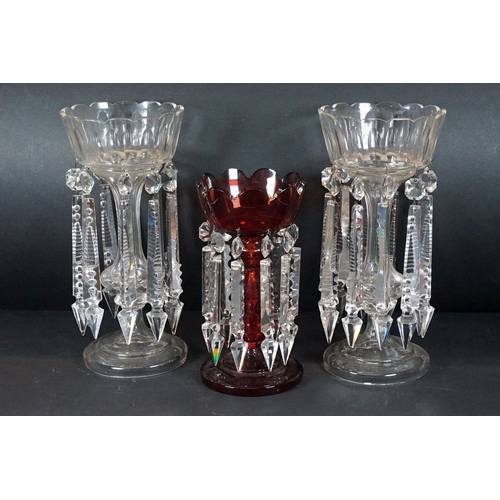 25 - Trio of antique cut glass lustres with prism droplets, two clear and one ruby glass example, tallest... 