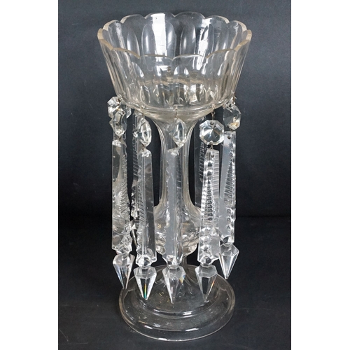 25 - Trio of antique cut glass lustres with prism droplets, two clear and one ruby glass example, tallest... 