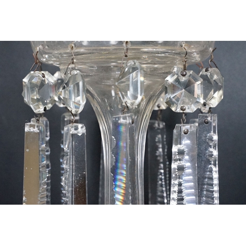 25 - Trio of antique cut glass lustres with prism droplets, two clear and one ruby glass example, tallest... 