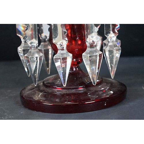 25 - Trio of antique cut glass lustres with prism droplets, two clear and one ruby glass example, tallest... 