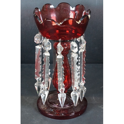 25 - Trio of antique cut glass lustres with prism droplets, two clear and one ruby glass example, tallest... 