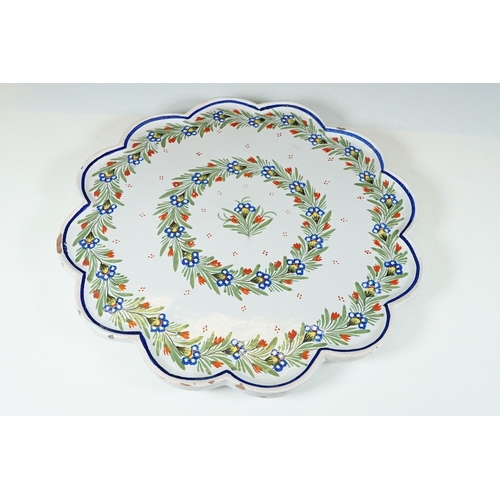 37 - Hand painted floral tea set on scalloped edge raised tray to include tea pot, two trefoil shape tea ... 