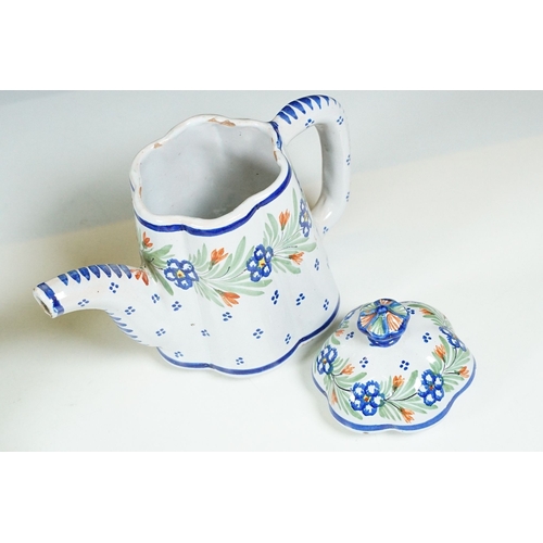 37 - Hand painted floral tea set on scalloped edge raised tray to include tea pot, two trefoil shape tea ... 