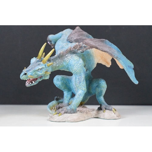 40 - Selection of mythical and dragon figurines to include The Danbury Mint Wizard's castle, Fabulous Dra... 