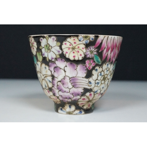 5 - Pair of 19th Century hand enamelled Chinese tea bowls, decorated with florals on a black ground. Bot... 