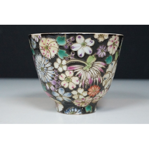 5 - Pair of 19th Century hand enamelled Chinese tea bowls, decorated with florals on a black ground. Bot... 