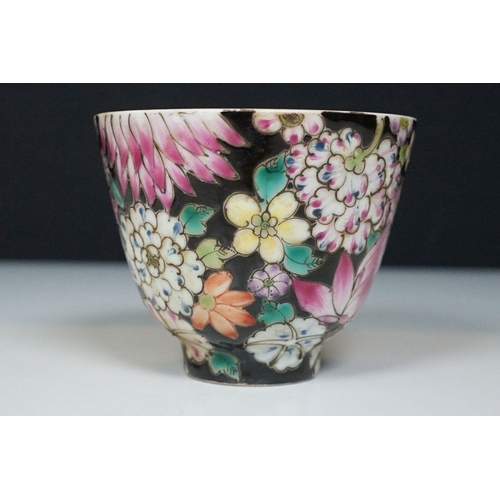 5 - Pair of 19th Century hand enamelled Chinese tea bowls, decorated with florals on a black ground. Bot... 