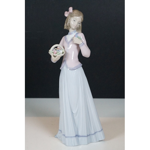 50 - Selection of Lladro lady figurines to include girl with umbrella 7636. Cinderella's lost slipper 482... 