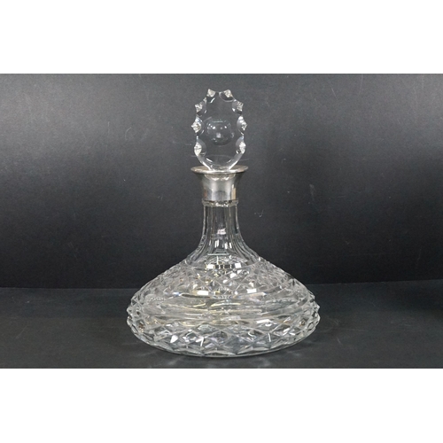 59 - Cut glass ships decanter together with a rectangular cut example both with silver collars, R&D and I... 