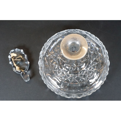 59 - Cut glass ships decanter together with a rectangular cut example both with silver collars, R&D and I... 