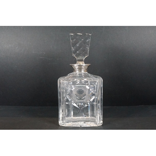 59 - Cut glass ships decanter together with a rectangular cut example both with silver collars, R&D and I... 