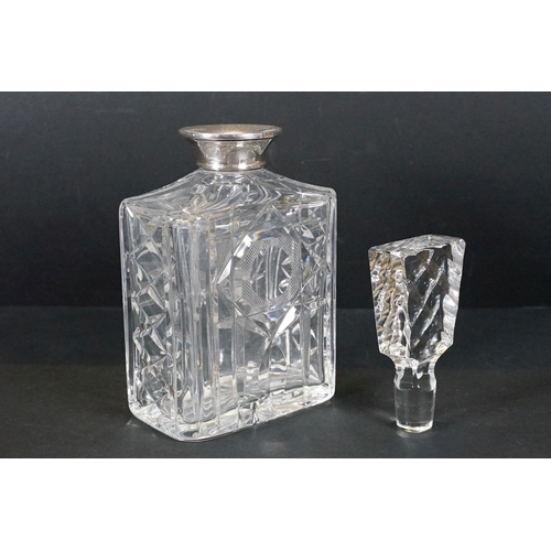 59 - Cut glass ships decanter together with a rectangular cut example both with silver collars, R&D and I... 