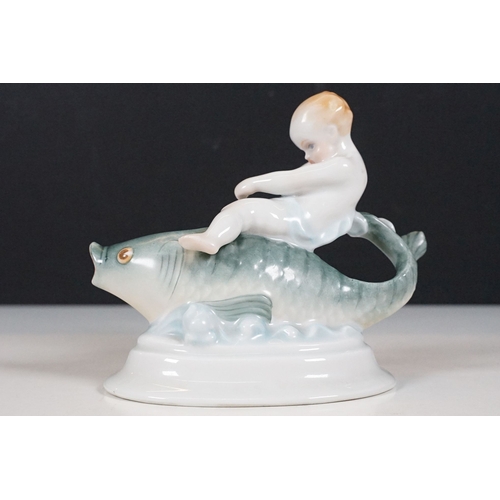 60 - Herend Hungary 'Boy riding a fish' figurine, W 14cm