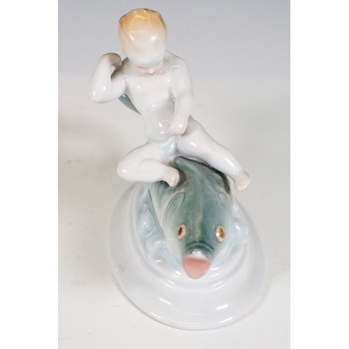 60 - Herend Hungary 'Boy riding a fish' figurine, W 14cm