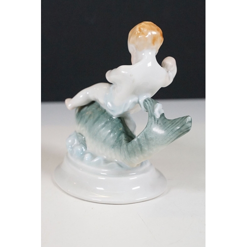 60 - Herend Hungary 'Boy riding a fish' figurine, W 14cm