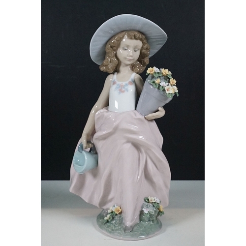 64 - Group of Lladro figurines to include seated girl 5549, girl with plant pot 7676, girl with bouquet 5... 