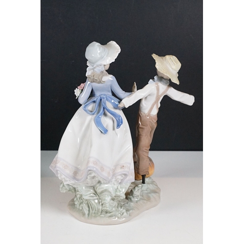 65 - Group of large Lladro figurines to include a mermaid with pearl 1368, Nao girl with pumpkins and gir... 