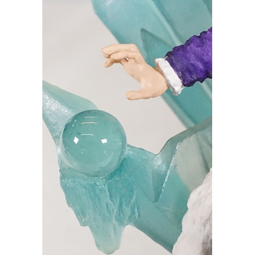 68 - Large glass crystal ball approx. H 10cm together with an Enchantica Vrost on Ice Throne figurine