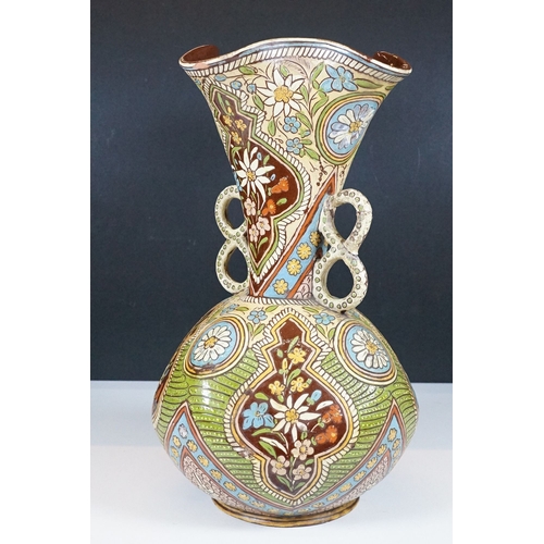 7 - Majolica twin handled vase with pinched rim, signed to base, H 32.5cm