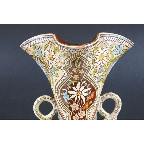 7 - Majolica twin handled vase with pinched rim, signed to base, H 32.5cm