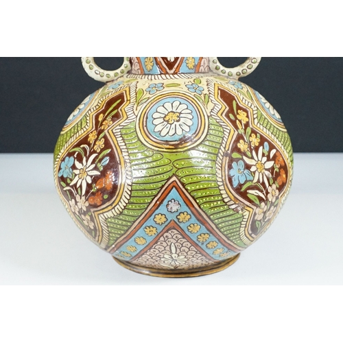 7 - Majolica twin handled vase with pinched rim, signed to base, H 32.5cm