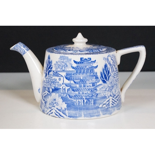 70 - TGG & Co Ltd blue and white tea pot with Chinese landscape scene together with a blue and white tran... 