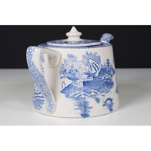 70 - TGG & Co Ltd blue and white tea pot with Chinese landscape scene together with a blue and white tran... 