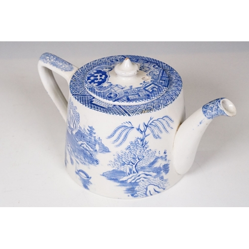 70 - TGG & Co Ltd blue and white tea pot with Chinese landscape scene together with a blue and white tran... 