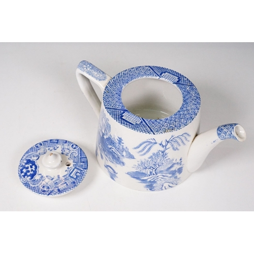 70 - TGG & Co Ltd blue and white tea pot with Chinese landscape scene together with a blue and white tran... 