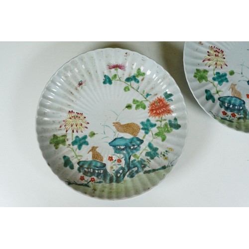 20 - Pair of Chinese Kangxi plates having ribbed porcelain bodies with over glaze enamelled florals and b... 