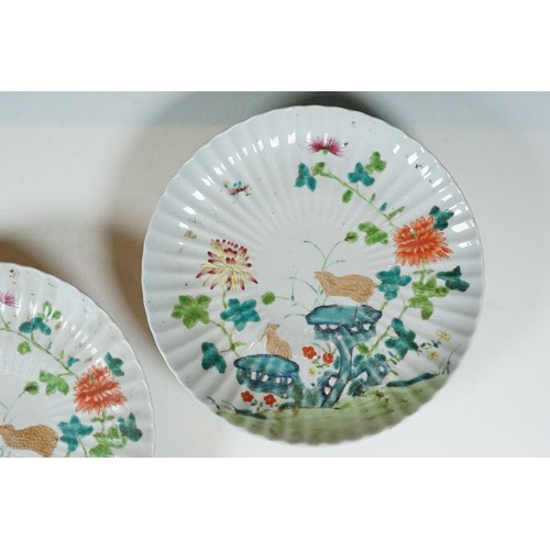 20 - Pair of Chinese Kangxi plates having ribbed porcelain bodies with over glaze enamelled florals and b... 