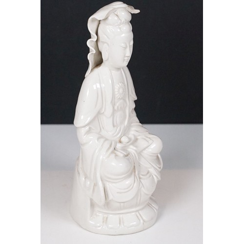 58 - Group of three Chinese blanc de chine figures to include two Guanyin figures and a male elder. Talle... 