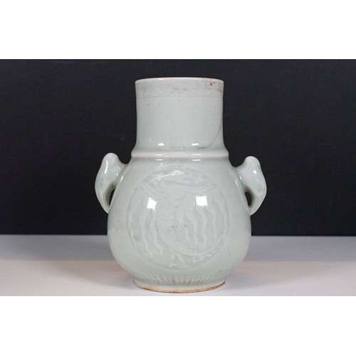 75 - Two Chinese celadon glaze vases to include a twin handles vase with dragon panel to front, together ... 