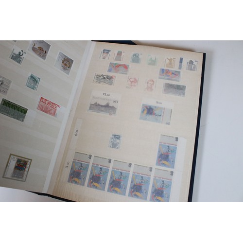 428 - Collection of mostly German stamps to include two albums of Great British QEII used stamps, an album... 