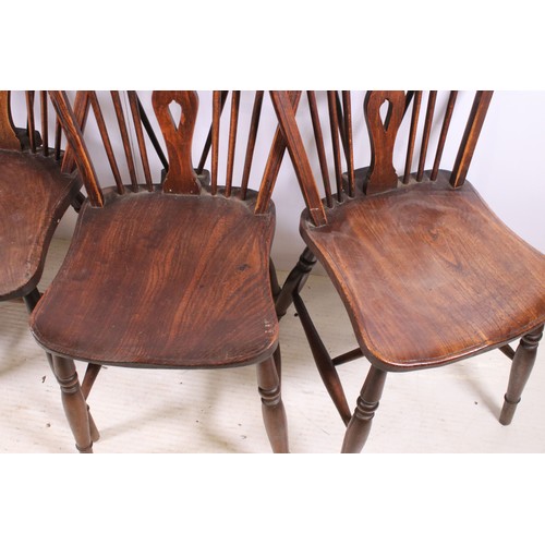 662 - Set of four oak wheel back chairs with turned legs and H shape stretcher, H 90cm