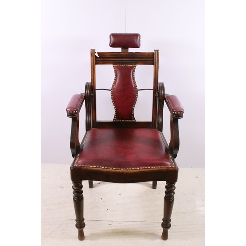 667 - Early 20th century patent barbers chair with stud detail, adjustable head rest and reclining back, n... 