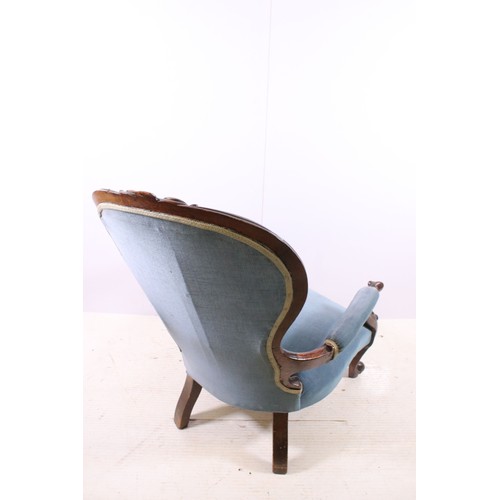 669 - 20th century mahogany blue button back arm chair on carved cabriole legs