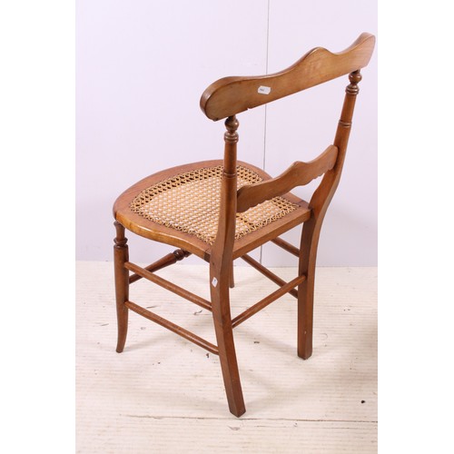 670 - Pair of early 20th century cane seat chairs with carved detail to back rest, H 83cm