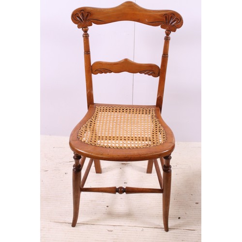 670 - Pair of early 20th century cane seat chairs with carved detail to back rest, H 83cm