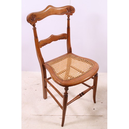 670 - Pair of early 20th century cane seat chairs with carved detail to back rest, H 83cm