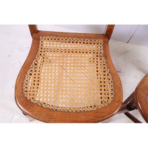 670 - Pair of early 20th century cane seat chairs with carved detail to back rest, H 83cm