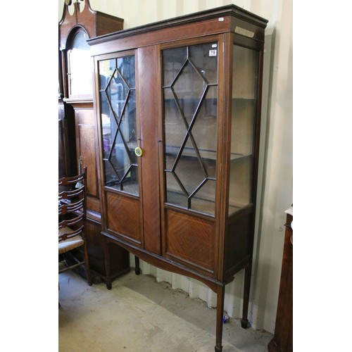 718 - 20th century inlay detail glass display cabinet with geometric design glazed doors opening to reveal... 