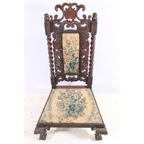 725 - 19th century continental mahogany ornately carved chair of low proportions on carved cabriole legs w... 