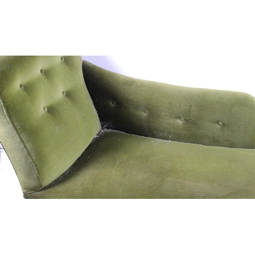 724 - 20th century green chaise longue with buttoned arm and back rail, with turned legs on casters, H 85c... 