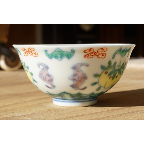 2 - Pair of 19th Century Chinese tea bowls to include a footed cup decorated with florals with a six cha... 